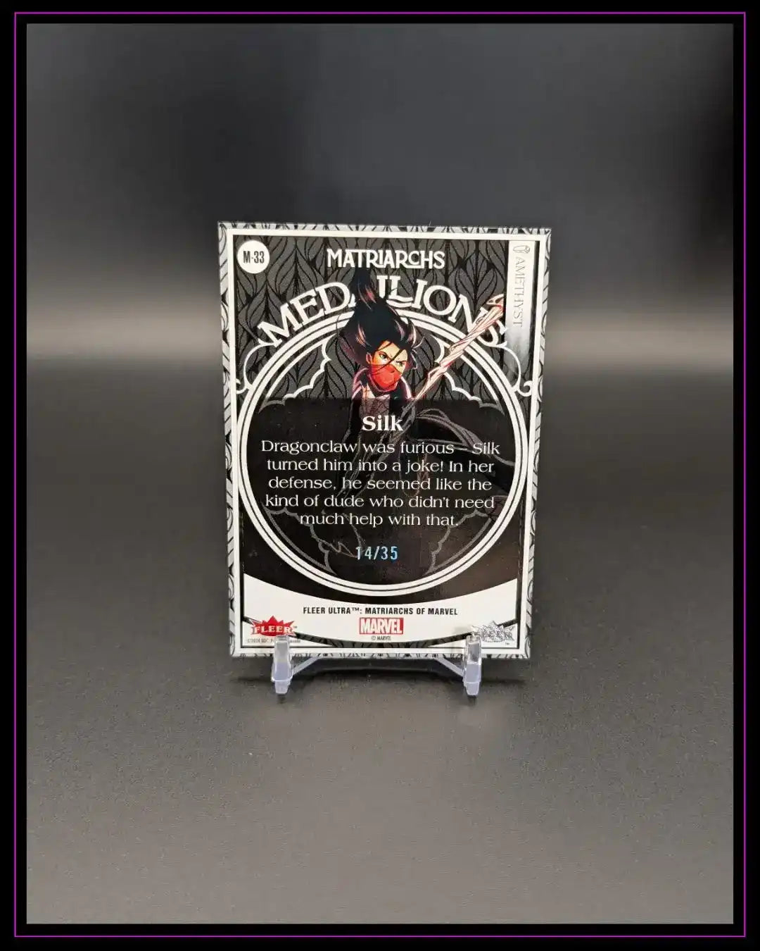 2024 Fleer Ultra Matriarchs of Marvel #M-33 Silk Medallions Purple Amethyst /35