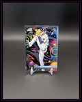 Baseball Trading Card mit Spieler in Wurfpose, farbenfroher, galaxieartiger Hintergrund.