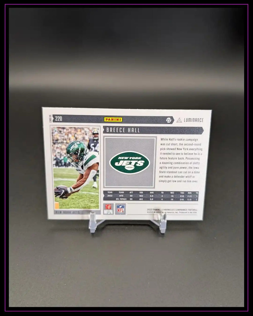 Rückseite einer Panini Football Trading Card von Breece Hall, New York Jets, mit Statistiken und Bild.
