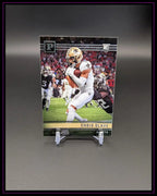 Football Trading Card mit Chris Olave im New Orleans Saints Trikot auf Rasen