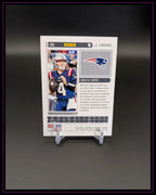 Rückseite einer NFL Trading Card mit Spielerbild, New England Patriots Logo und Statistiken.